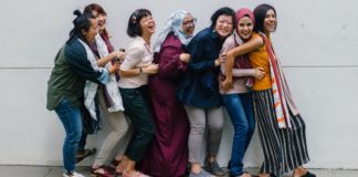 Lifestyle Photography - Group of Ethnic Women Laughing in Line